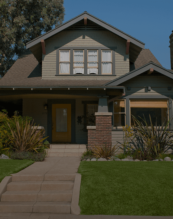 Cozy suburban house with lush garden.